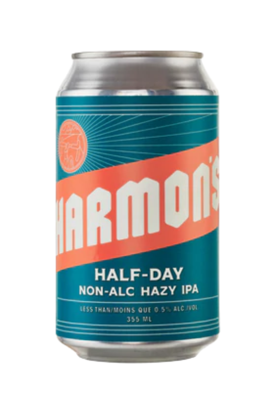 A can of Harmon's Half-Day Non-Alc Hazy IPA with a predominantly yellow label and blue text.